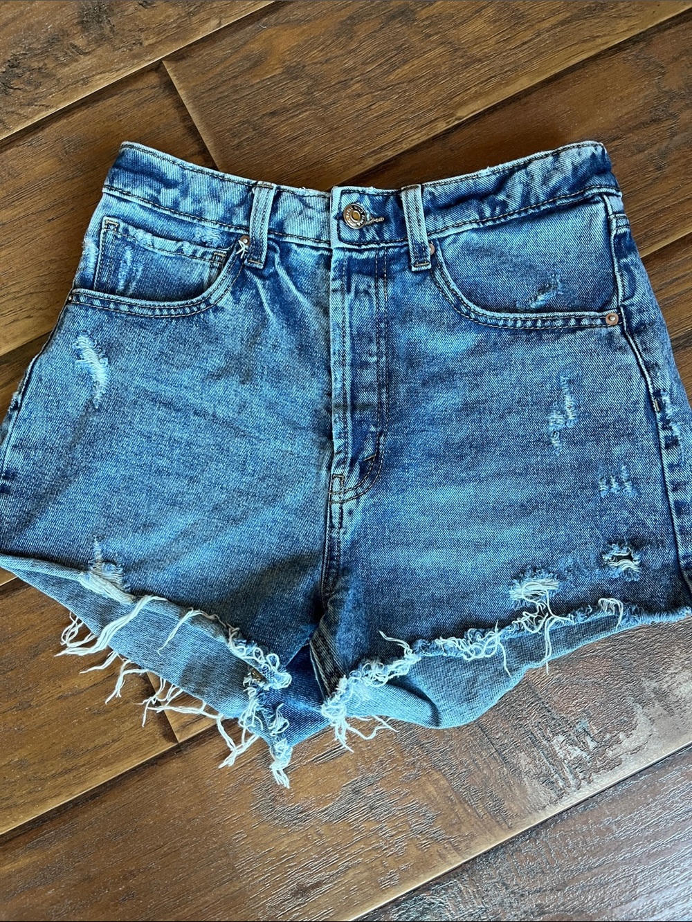 High-Rise Distressed Denim Shorts in Blue Size 4